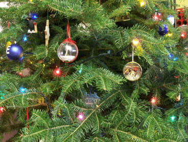 ornaments and lights on christmas tree