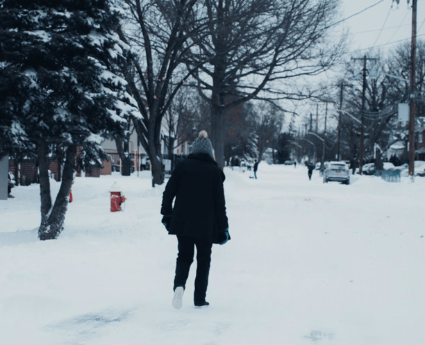 person walking in snow