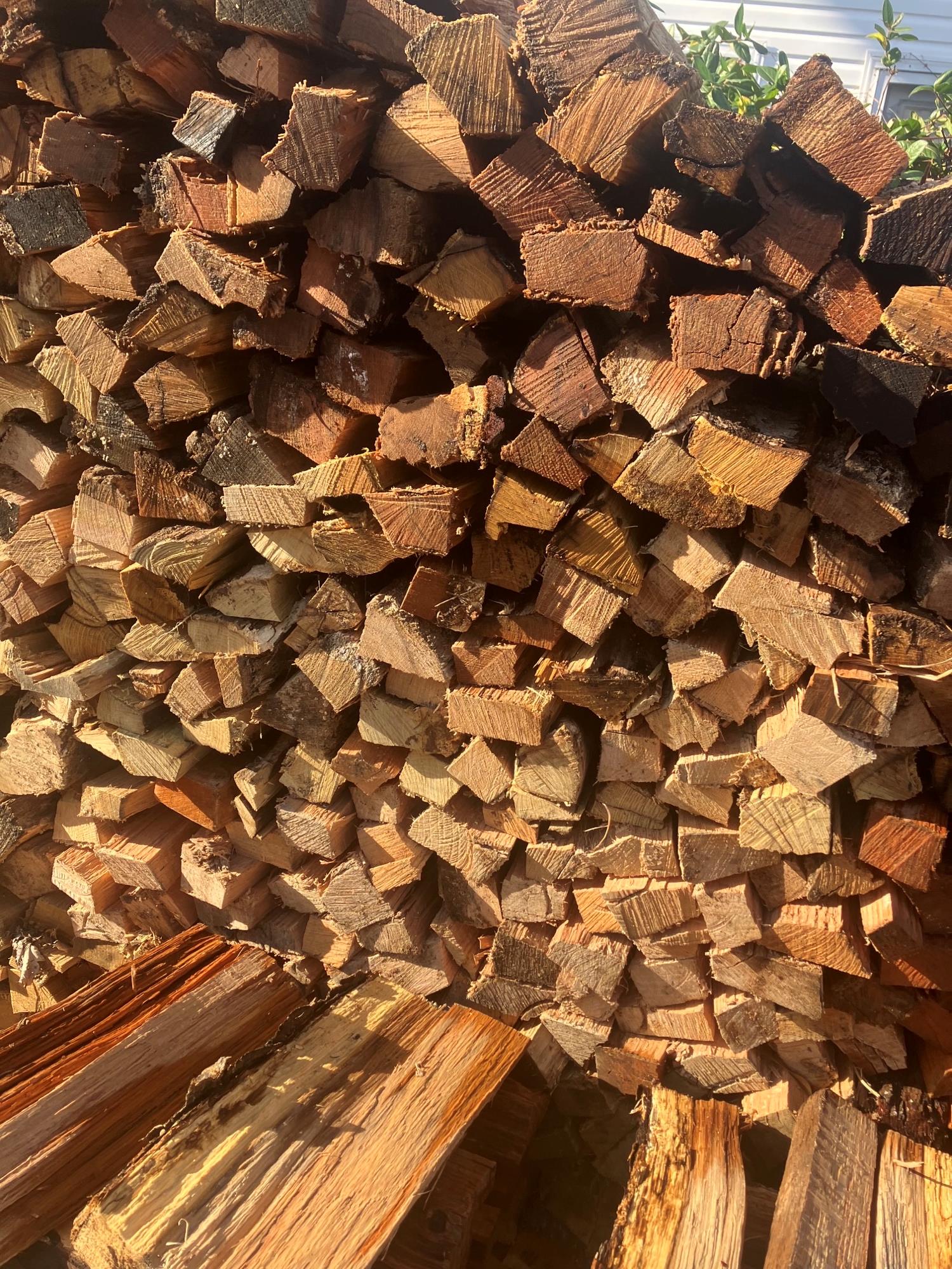 Image of stacked Firewood for Sale at Monster Tree Service of Alexandria 
