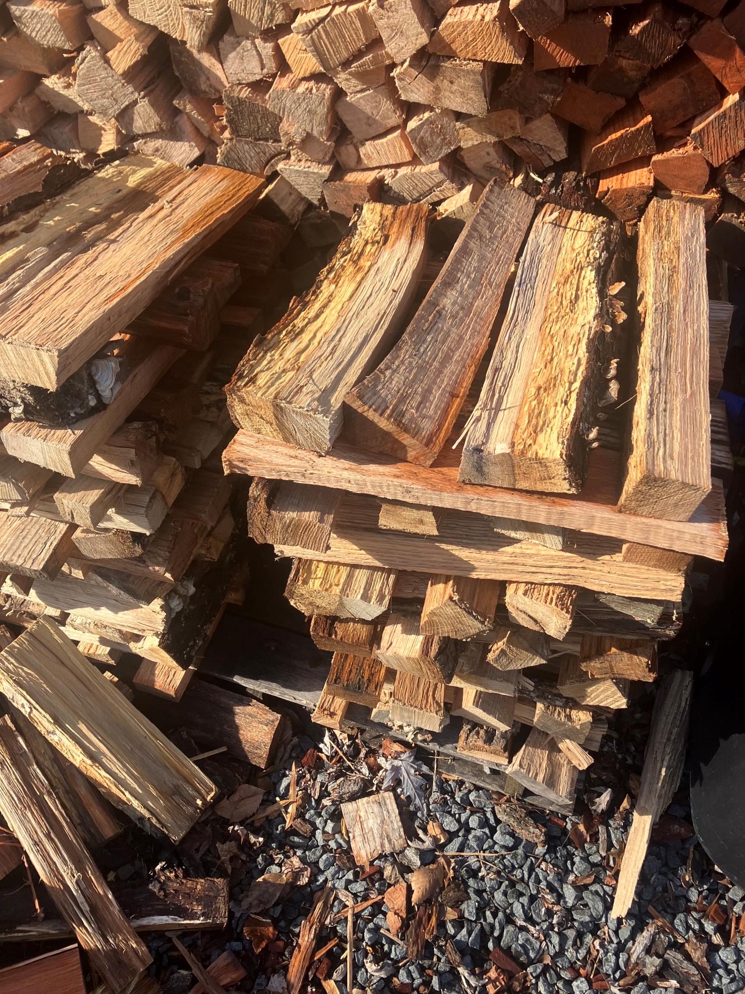 Image of stacked Firewood for Sale at Monster Tree Service of Alexandria 